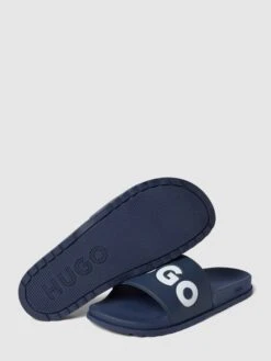 HUGO Slides Mit Label-Details Modell 'MATCH' - Dunkelblau -Geox Verkaufsgeschäft 6cp4cl2mal73ci1n8h8j6dic95554e2b996kgcqc9cp50lad8hakoha79ta4cj2568s52cql9t54mcq7a0o6ccpmcpj62e9m65j64p1kc4qj6o9k6hi3geb46dhjee9jc4p68e0