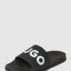 HUGO Slides Mit Label-Details Modell 'MATCH' - Schwarz -Geox Verkaufsgeschäft 6h0kgh2f895j0k1l9kpj6gam8d136gak6gsk8ka1914kaci79t14uia9a0o4sgpl9p7jac2590rjgka26l3j0d1gclhj6e35cgq38cpk6ksm8e3160qj4p1p6gr34e1kckrj6d8