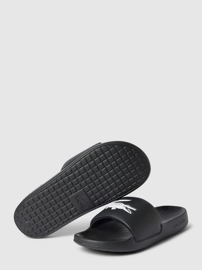 Lacoste Slides Mit Label-Details Modell 'Croco' - Schwarz 7 Lacoste Slides Mit Label-Details Modell 'Croco' - Schwarz – Bild 5