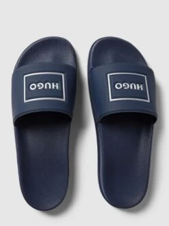 HUGO Slides Mit Label-Detail Modell 'Match' - Dunkelblau -Geox Verkaufsgeschäft 758jieaaa984sh9oal0j4cqc8913gihk9d9kojaf9h2kgihl88p32c2b90okacqc6h442h9map93al1l993m6ohn65hm4d9mcgrj0e1k64pm8ohmchh66db4ccsmae1m6pim2p8