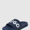 HUGO Slides Mit Label-Details Modell 'MATCH' - Dunkelblau 1 HUGO Slides Mit Label-Details Modell 'MATCH' - Dunkelblau -Geox Verkaufsgeschäft 84o54c1l9d2kmk2f6l148hqk9h4j8e228l74chqj9d1kglama145ak268l8kiki69l2j4la79t7kii1i9oo34pb66pi3cc9g65gm2dhk74rm8o9kc5imachkckqjgc1l68r6ad0
