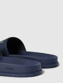 HUGO Slides Mit Label-Detail Modell 'Match' - Dunkelblau -Geox Verkaufsgeschäft 8h142i9i95b4gcq17164ml1m74qjgi259gqj6iqea4rk4cie653jega8a51l2dpn6d74qga18h5l0c248so66eb2c4s3gor670smac1kc5im2e33ccq66c1l6dhmcd9o61im2c8