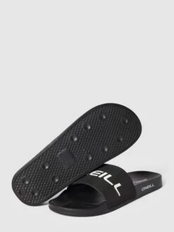 ONeill Slides Mit Label-Applikation - Schwarz 10 ONeill Slides Mit Label-Applikation - Schwarz -Geox Verkaufsgeschäft 9t34ela391948eal6d432j2f60ok2dad90okcj2l8d8l2jhm8d342kqeacpksh9o61354hiba57l6ca26co6cohmc5ijiohnchgm4e9kckrjaohn6goj0cpp6dgjicpjcoojac8