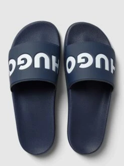 HUGO Slides Mit Label-Details Modell 'MATCH' - Dunkelblau -Geox Verkaufsgeschäft ad5j0khk852j2dib6ks3adpo6cqkggqg7185akho8574mkac9d756g9ja50jglib8d4jaciga4qjiga6a4o36cj170o68eb4cdgjgcpkc4p3ie1m6cpjcdhic9i62dj668o38p8